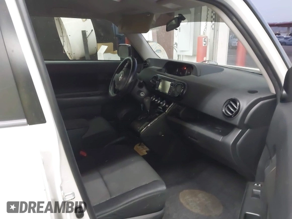 2014 Scion xB with VIN JTLZE4FE1EJ060281, listed as a IAAI auction lot 41477386 with 61,423 mi miles. Bid and sale history available at carsss.com. Image 5.