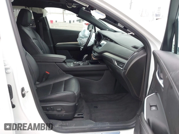 2022 Cadillac XT4 FWD Premium Luxury with VIN 1GYFZCR49NF100393, listed as a IAAI auction lot 42497187 with 23,672 mi miles and . Bid and sale history available at DreamBid. Image 5.