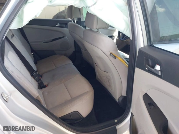 2018 Hyundai Tucson SE with VIN KM8J23A48JU646278, listed as a IAAI auction lot 41941577 with 115,228 mi miles. Bid and sale history available at carsss.com. Image 8.
