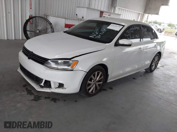 2014 Volkswagen Jetta SE z VIN 3VWD17AJ3EM265396, wystawiony jako IAAI lot #42434771 z przebiegiem 114 931 mil mil oraz . Historia ofert i sprzedaży dostępna na DreamBid. Obrazek 17.