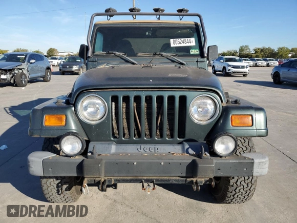 2002 Jeep Wrangler Sahara with VIN 1J4FA59SX2P749398, listed as a Copart auction lot 80524844 with 92,300 mi miles and Clean Title. Bid and sale history available at carsss.com. Image 5.