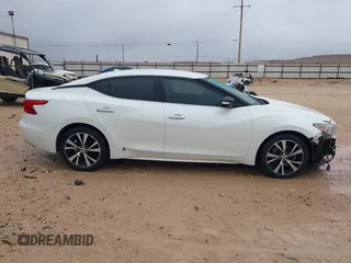 2018 Nissan Maxima S with VIN 1N4AA6AP7JC383425, listed as a IAAI auction lot 41962455 with 133,150 mi miles and . Bid and sale history available at DreamBid. Image 14.