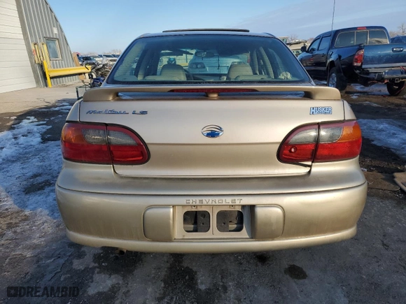2003 Chevrolet Malibu LS with VIN 1G1NE52J53M729482, listed as a Copart auction lot 88150405 with 87,399 mi miles and Salvage Title. Bid and sale history available at carsss.com. Image 6.