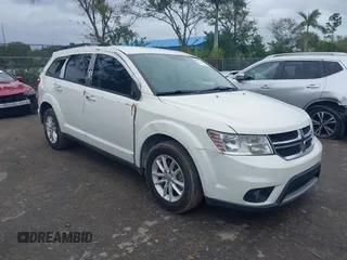 2017 Dodge Journey SXT z VIN 3C4PDDBG3HT592061, wystawiony jako IAAI lot #38299155 z przebiegiem 127 856 mil mil oraz . Historia ofert i sprzedaży dostępna na DreamBid. Obrazek 1.