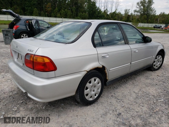 2000 Honda Civic VP with VIN 2HGEJ6611YH525471, listed as a Copart auction lot 69864324 with 115,313 mi miles and Salvage Title. Bid and sale history available at carsss.com. Image 3.