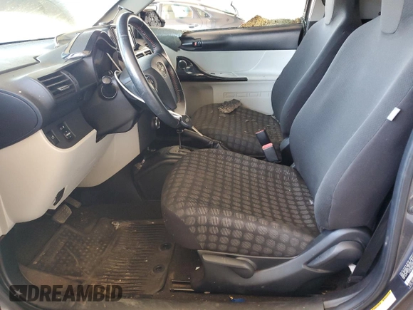 2012 Scion iQ z VIN JTNJJXB09CJ012794, wystawiony jako Copart lot #52983435 z przebiegiem 135 927 mil mil oraz Szkoda całkowita • Salvage title. Historia ofert i sprzedaży dostępna na DreamBid. Obrazek 7.