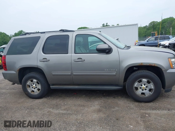 2009 Chevrolet Tahoe 2LT z VIN 1GNFK23069R250256, wystawiony jako IAAI lot #42448620 z przebiegiem 207 255 mil mil oraz . Historia ofert i sprzedaży dostępna na DreamBid. Obrazek 13.