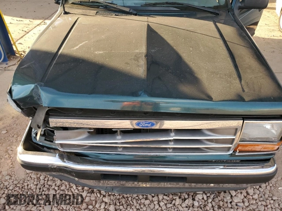 1994 Ford Explorer Eddie Bauer z VIN 1FMDU32X3RUD38012, wystawiony jako Copart lot #77417304 z przebiegiem 83 648 mil mil oraz Szkoda całkowita • Salvage title. Historia ofert i sprzedaży dostępna na DreamBid. Obrazek 14.
