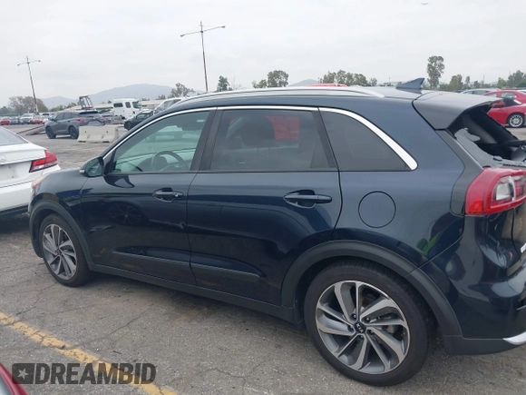 2017 Kia Niro Touring with VIN KNDCE3LC6H5048381, listed as a IAAI auction lot 42035129 with 133,559 mi miles. Bid and sale history available at carsss.com. Image 14.