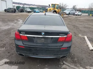 2015 BMW 7 Series 750i xDrive with VIN WBAYB6C59FD965820, listed as a IAAI auction lot 41558215 with 142,617 mi miles. Bid and sale history available at carsss.com. Image 15.
