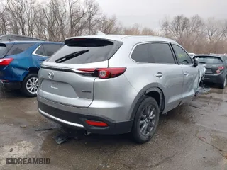 2021 Mazda CX-9 Touring with VIN JM3TCBCY2M0507027, listed as a IAAI auction lot 41079723 with 61,387 mi miles. Bid and sale history available at carsss.com. Image 4.