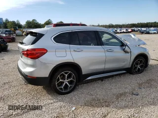2017 BMW X1 sDrive28i with VIN WBXHU7C30H5H37516, listed as a Copart auction lot 68677332 with 0 mi miles. Bid and sale history available at carsss.com. Image 3.