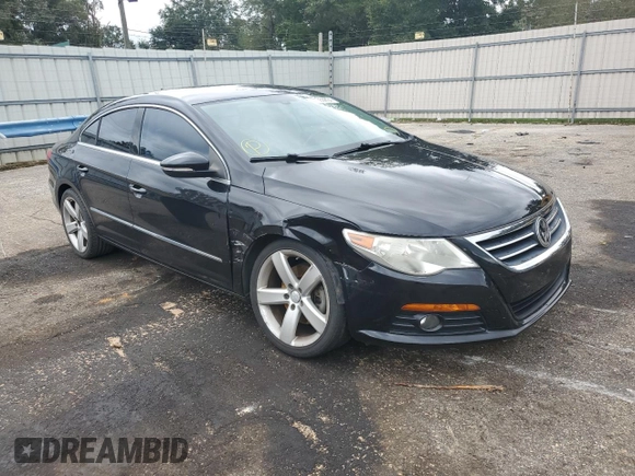 2011 Volkswagen CC Lux Plus with VIN WVWHN7ANXBE726381, listed as a Copart auction lot 71350894 with 128,046 mi miles and Salvage Title. Bid and sale history available at carsss.com. Image 4.