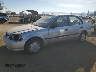 1997 Honda Civic DX with VIN 2HGEJ6623VH542972, listed as a Copart auction lot 84721694 with 257,296 mi miles and Salvage Title. Bid and sale history available at carsss.com. Image 1.