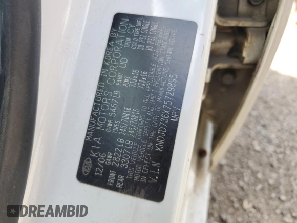 2007 Kia Sorento LX z VIN KNDJD736X75729895, wystawiony jako Copart lot #68039404 z przebiegiem 201 067 mil mil oraz Szkoda całkowita • Salvage title. Historia ofert i sprzedaży dostępna na DreamBid. Obrazek 12.