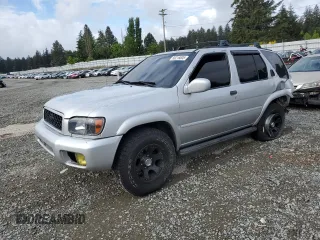 2003 Nissan Pathfinder LE z VIN JN8DR09Y73W801482, wystawiony jako Copart lot #56216005 z przebiegiem 238 781 mil mil oraz Szkoda całkowita • Salvage title. Historia ofert i sprzedaży dostępna na DreamBid. Obrazek 1.
