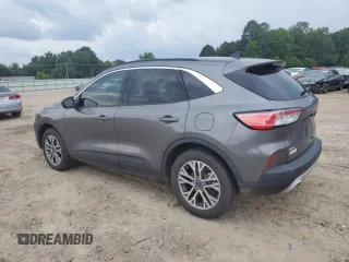 2021 Ford Escape SEL with VIN 1FMCU9H68MUB09069, listed as a Copart auction lot 58760215 with 27,694 mi miles and Salvage title. Bid and sale history available at DreamBid. Image 2.