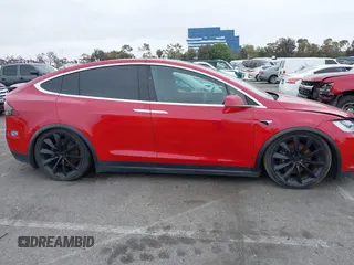 2021 Tesla Model X Long Range Plus with VIN 5YJXCBE24MF324376, listed as a IAAI auction lot 42034108 with Not Provided miles and . Bid and sale history available at carsss.com. Image 13.
