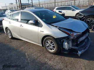 2019 Toyota Prius L Eco with VIN JTDKARFU2K3082593, listed as a IAAI auction lot 41657698 with 239,412 mi miles. Bid and sale history available at carsss.com. Image 1.