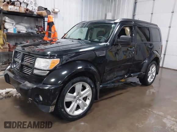2011 Dodge Nitro Heat with VIN 1D4PU4GK1BW602572, listed as a IAAI auction lot 41529030 with 134,482 mi miles. Bid and sale history available at carsss.com. Image 18.