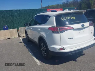 2017 Toyota RAV4 LE with VIN JTMBFREV4HJ112595, listed as a IAAI auction lot 42234289 with 207,379 mi miles and . Bid and sale history available at carsss.com. Image 3.