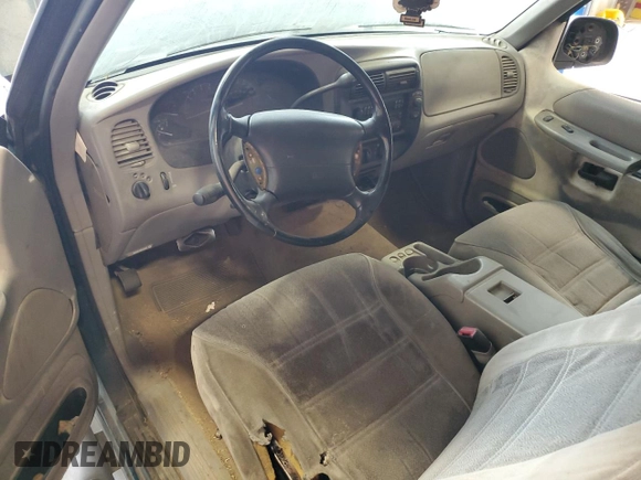 1998 Ford Explorer Sport with VIN 1FMYU22X4WUB36948, listed as a Copart auction lot 76699374 with 266,977 mi miles and Salvage title. Bid and sale history available at DreamBid. Image 8.