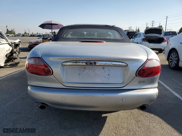 2002 Jaguar XK8 with VIN SAJDA42C22NA30222, listed as a Copart auction lot 73994494 with NaN miles and Salvage Title. Bid and sale history available at carsss.com. Image 6.