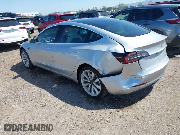 2018 Tesla Model 3 Long Range Battery with VIN 5YJ3E1EB5JF100578, listed as a IAAI auction lot 41959766 with 57,931 mi miles and . Bid and sale history available at DreamBid. Image 3.