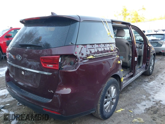 2020 Kia Sedona LX with VIN KNDMB5C18L6617371, listed as a IAAI auction lot 41378524 with 59,092 mi miles. Bid and sale history available at carsss.com. Image 4.