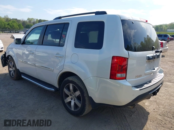 2013 Honda Pilot Touring with VIN 5FNYF3H92DB034731, listed as a IAAI auction lot 42049853 with 127,278 mi miles and . Bid and sale history available at DreamBid. Image 3.