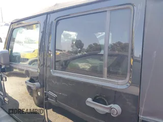 2017 Jeep Wrangler Unlimited Sport with VIN 1C4HJWDG1HL551090, listed as a IAAI auction lot 42619497 with 92,693 mi miles and . Bid and sale history available at DreamBid. Image 14.