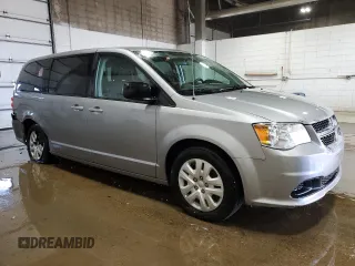 2018 Dodge Grand Caravan SE Plus with VIN 2C4RDGBG0JR254703, listed as a Copart auction lot 52235875 with 96,522 mi miles and Clean Title. Bid and sale history available at DreamBid. Image 4.