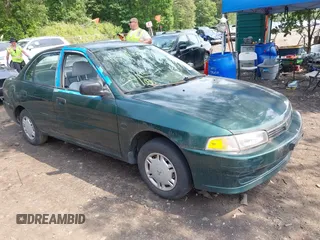 1998 Mitsubishi Mirage DE z VIN JA3AY26A2WU001675, wystawiony jako IAAI lot #42484995 z przebiegiem 89 680 mil mil oraz . Historia ofert i sprzedaży dostępna na DreamBid. Obrazek 1.