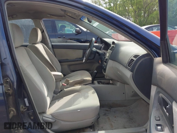 2006 Kia Spectra EX with VIN KNAFE122965293874, listed as a IAAI auction lot 42111219 with 241,644 mi miles. Bid and sale history available at carsss.com. Image 5.