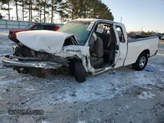 2003 Ford F-150 XL with VIN 1FTRX17W63NA12390, listed as a Copart auction lot 42127405 with 282,656 mi miles and Salvage Title. Bid and sale history available at carsss.com. Image 1.