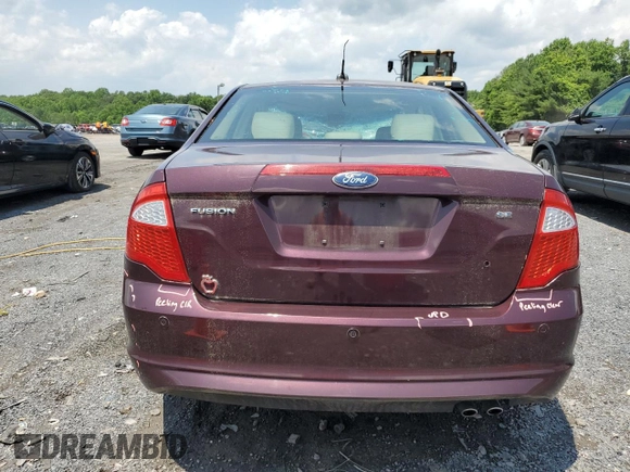 2012 Ford Fusion SE z VIN 3FAHP0HAXCR253297, wystawiony jako Copart lot #60302645 z przebiegiem 138 619 mil mil oraz Szkoda całkowita • Salvage title. Historia ofert i sprzedaży dostępna na DreamBid. Obrazek 6.