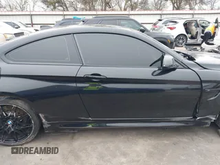 2019 BMW M4 with VIN WBS4Y9C53KAH82910, listed as a IAAI auction lot 41570315 with 59,227 mi miles. Bid and sale history available at carsss.com. Image 14.