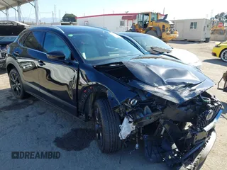 2023 Mazda CX-30 Premium с VIN 3MVDMBDY9PM588892, выставлен на аукционе IAAI как лот 42267744 с пробегом 9 293 миль миль и . История ставок и продаж доступна на DreamBid. Изображение 1.