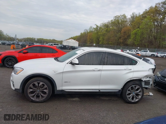 2018 BMW X4 xDrive28i z VIN 5UXXW3C57J0T82081, wystawiony jako IAAI lot #41991254 z przebiegiem 100 654 mil mil oraz . Historia ofert i sprzedaży dostępna na DreamBid. Obrazek 14.