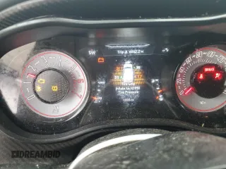 2023 Dodge Challenger R/T Scat Pack Widebody z VIN 2C3CDZFJ6PH593668, wystawiony jako Copart lot #45582495 z przebiegiem 13 555 mil mil oraz Szkoda całkowita • Salvage title. Historia ofert i sprzedaży dostępna na DreamBid. Obrazek 9.
