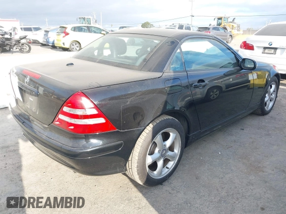 2002 Mercedes-Benz SLK 320 with VIN WDBKK65F02F241087, listed as a IAAI auction lot 41894441 with 100,232 mi miles and . Bid and sale history available at DreamBid. Image 4.