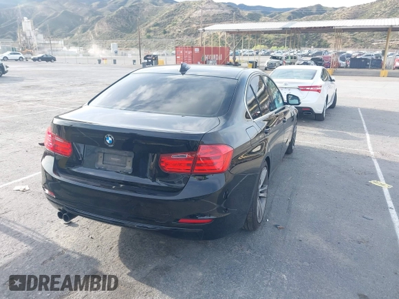 2015 BMW 3 Series 328i with VIN WBA3A5C55FP604316, listed as a IAAI auction lot 41915627 with 120,594 mi miles. Bid and sale history available at carsss.com. Image 4.