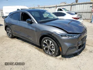 2023 Ford Mustang Mach-E Premium with VIN 3FMTK3SU2PMA70370, listed as a Copart auction lot 65089015 with 32,785 mi miles and Salvage title. Bid and sale history available at DreamBid. Image 4.