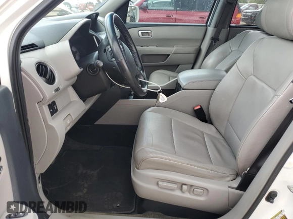 2013 Honda Pilot Touring z VIN 5FNYF4H91DB062722, wystawiony jako Copart lot #58308165 z przebiegiem 130 896 mil mil oraz Szkoda całkowita • Salvage title. Historia ofert i sprzedaży dostępna na DreamBid. Obrazek 7.