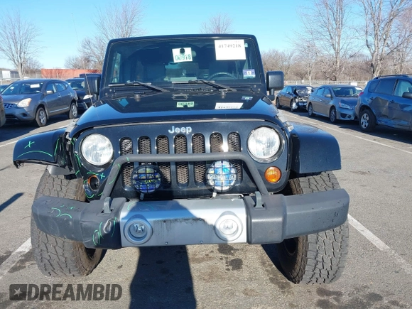 2010 Jeep Wrangler Unlimited Sahara with VIN 1J4HA5H16AL215659, listed as a IAAI auction lot 41749218 with 55,544 mi miles. Bid and sale history available at carsss.com. Image 12.