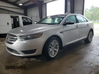 2014 Ford Taurus Limited with VIN 1FAHP2F82EG115503, listed as a Copart auction lot 64836755 with 111,691 mi miles and Salvage title. Bid and sale history available at DreamBid. Image 1.