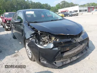 2018 Toyota Corolla L with VIN 5YFBURHE8JP817144, listed as a IAAI auction lot 42415126 with 188,829 mi miles and . Bid and sale history available at DreamBid. Image 1.