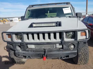 2003 Hummer H2 with VIN 5GRGN23U13H128617, listed as a IAAI auction lot 41494349 with 135,295 mi miles. Bid and sale history available at carsss.com. Image 6.