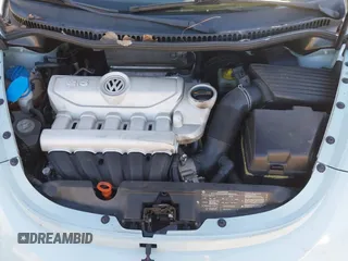 2010 Volkswagen New Beetle Coupe with VIN 3VWRW3AG6AM032191, listed as a IAAI auction lot 41571281 with 86,500 mi miles. Bid and sale history available at carsss.com. Image 10.