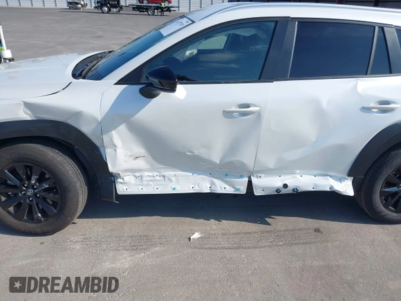2024 Mazda CX-50 S Select with VIN 7MMVABAM2RN242725, listed as a IAAI auction lot 41477519 with 4,808 mi miles and . Bid and sale history available at DreamBid. Image 6.